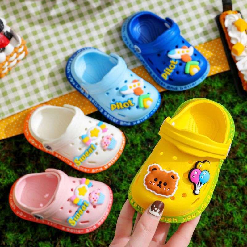Kids’ assorted animal slip-on clogs in white, blue, yellow, orange, and pink