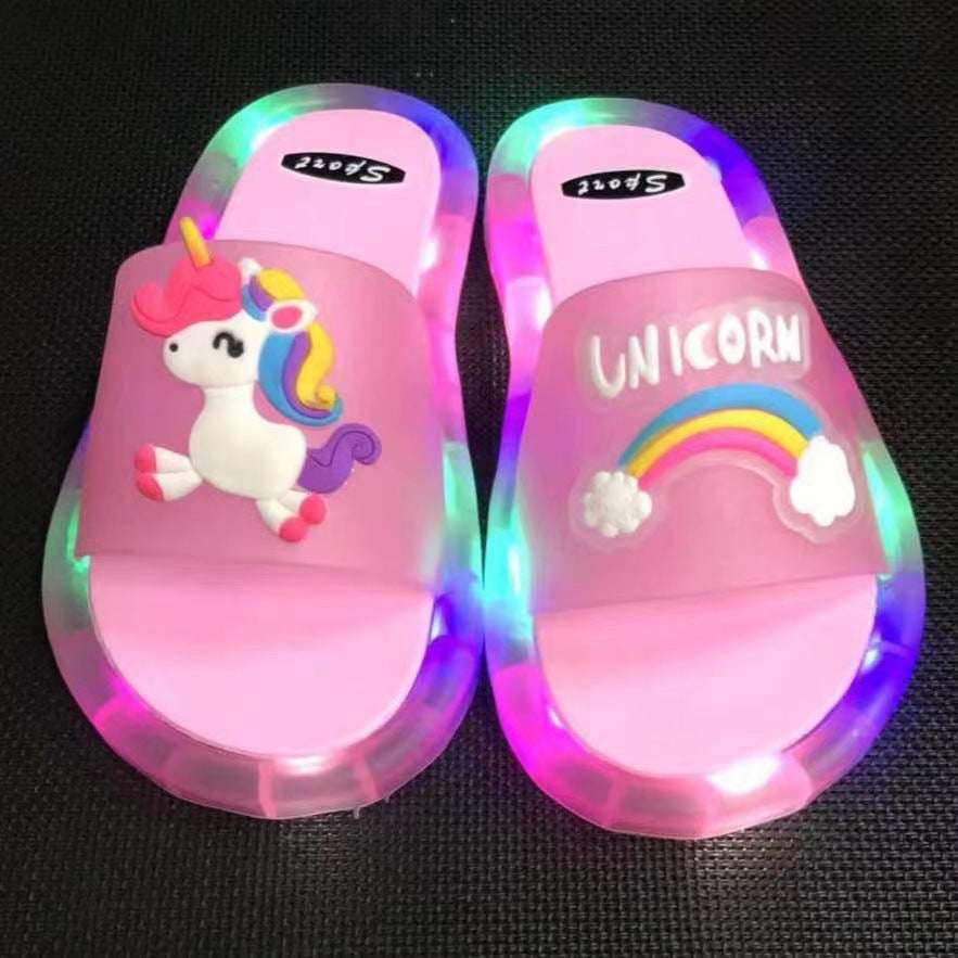 Light-up kids unicorn sandals, pink translucent straps with rainbow horse graphic