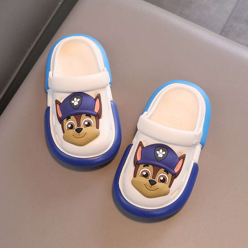 Kids Paw Patrol croc-style slippers, white with blue edging and dog character graphics