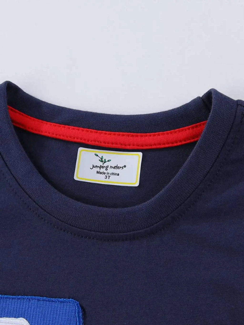 Dark navy kids truck graphic short-sleeve T-shirt with red-trim neckline