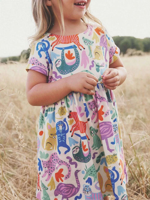 Girls animal print short-sleeve dress in multicolor creatures on white, round neck