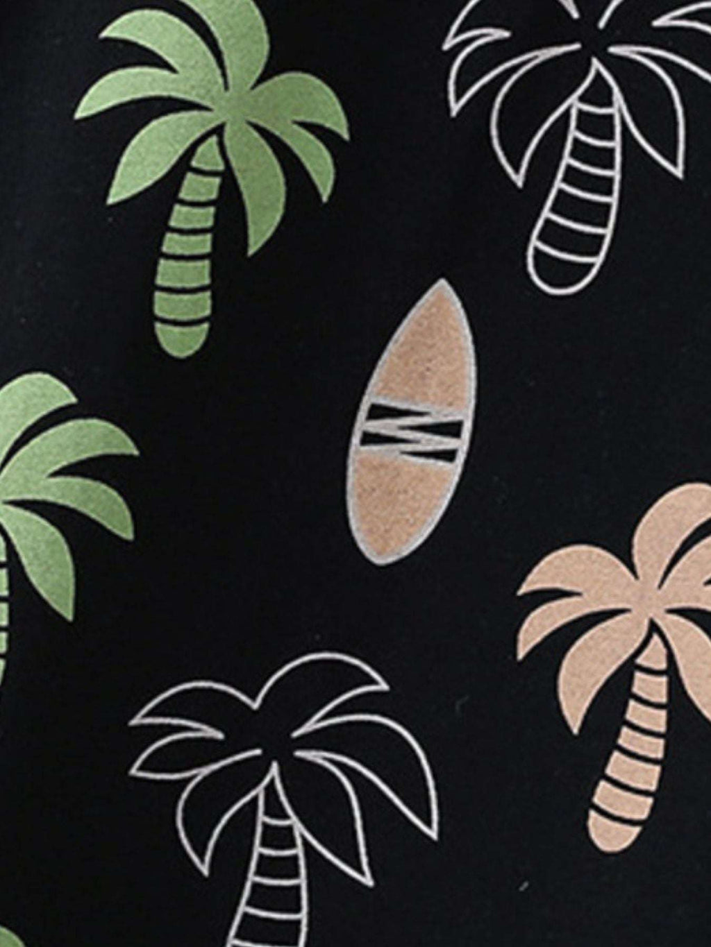 Black tropical print fabric close-up with palms and striped fruit