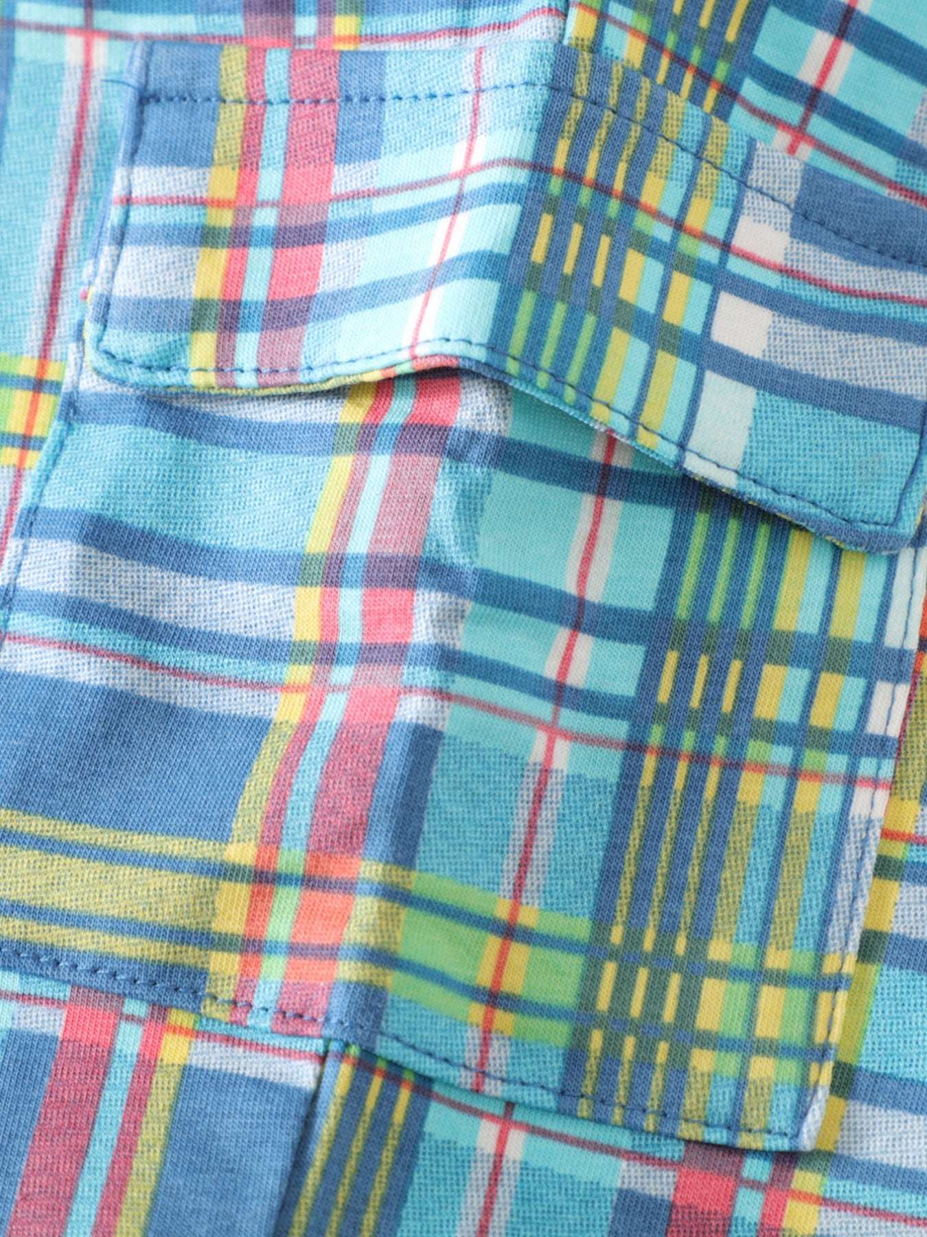 Plaid shorts pocket area with bright grid pattern