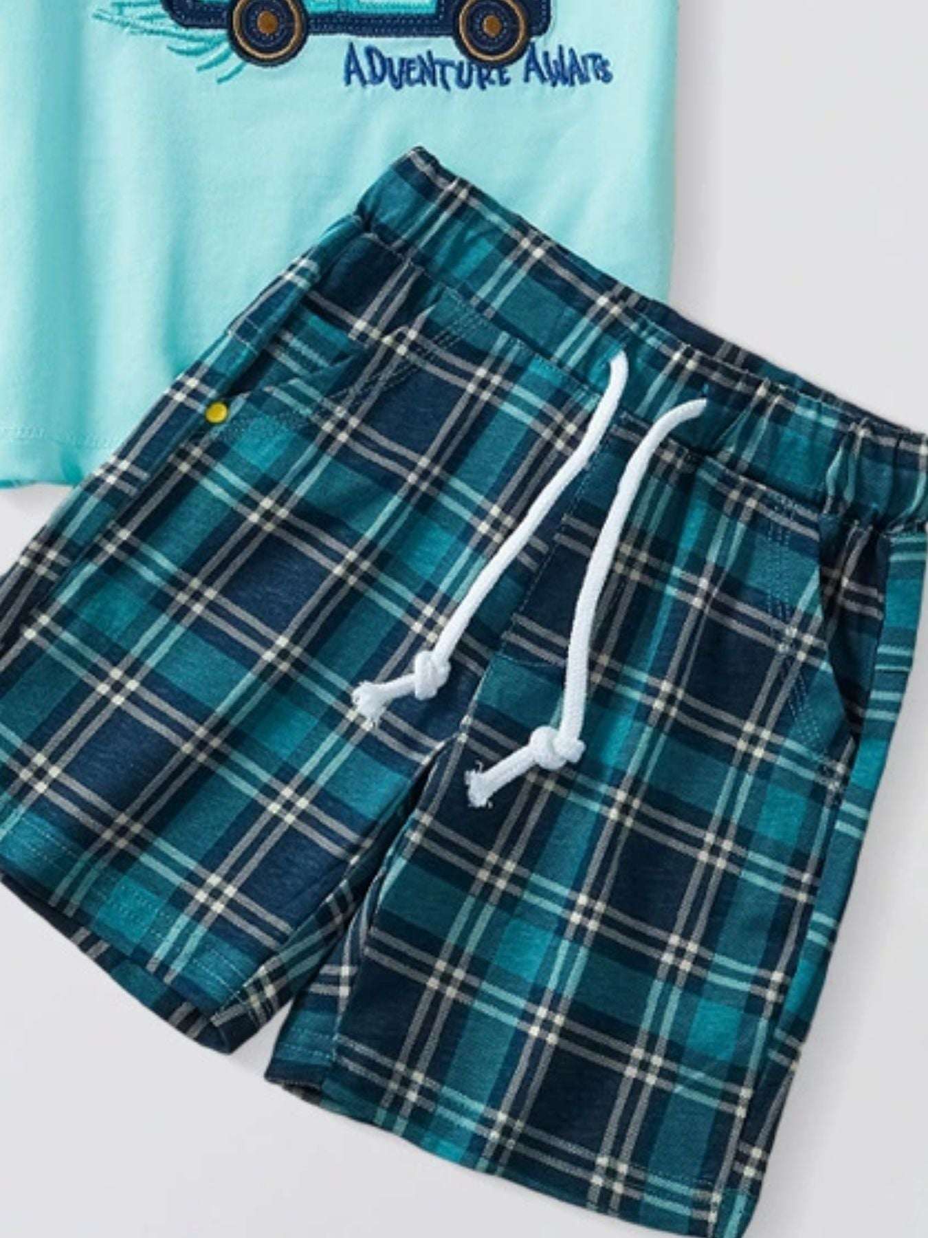 Kids teal plaid drawstring shorts with white drawcord