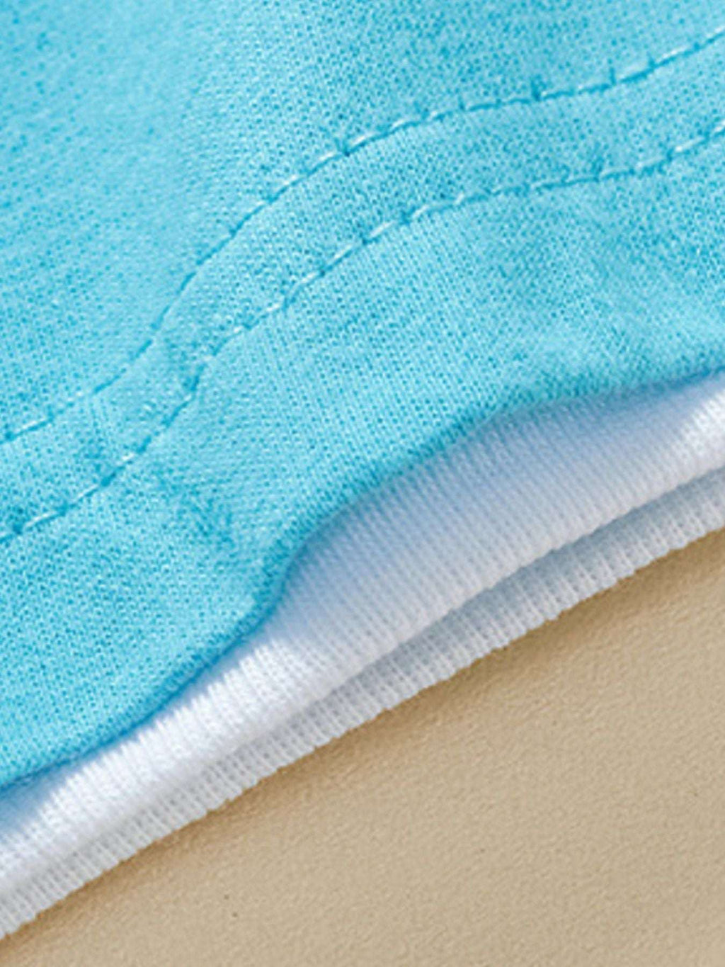 Pastel blue tee with stitched curved hem and white inner facing