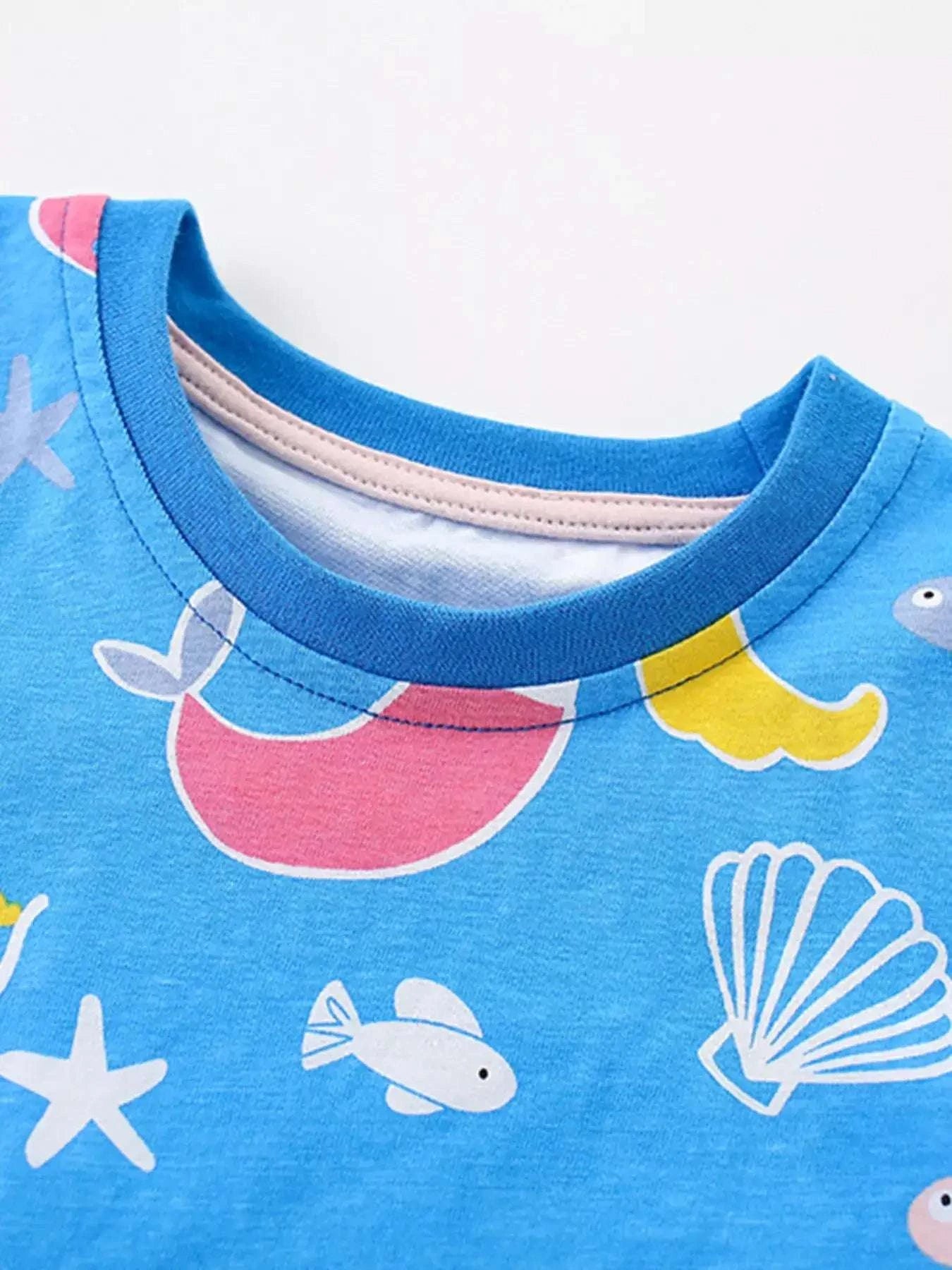 Sky-blue ocean print round-neck top with fish and starfish