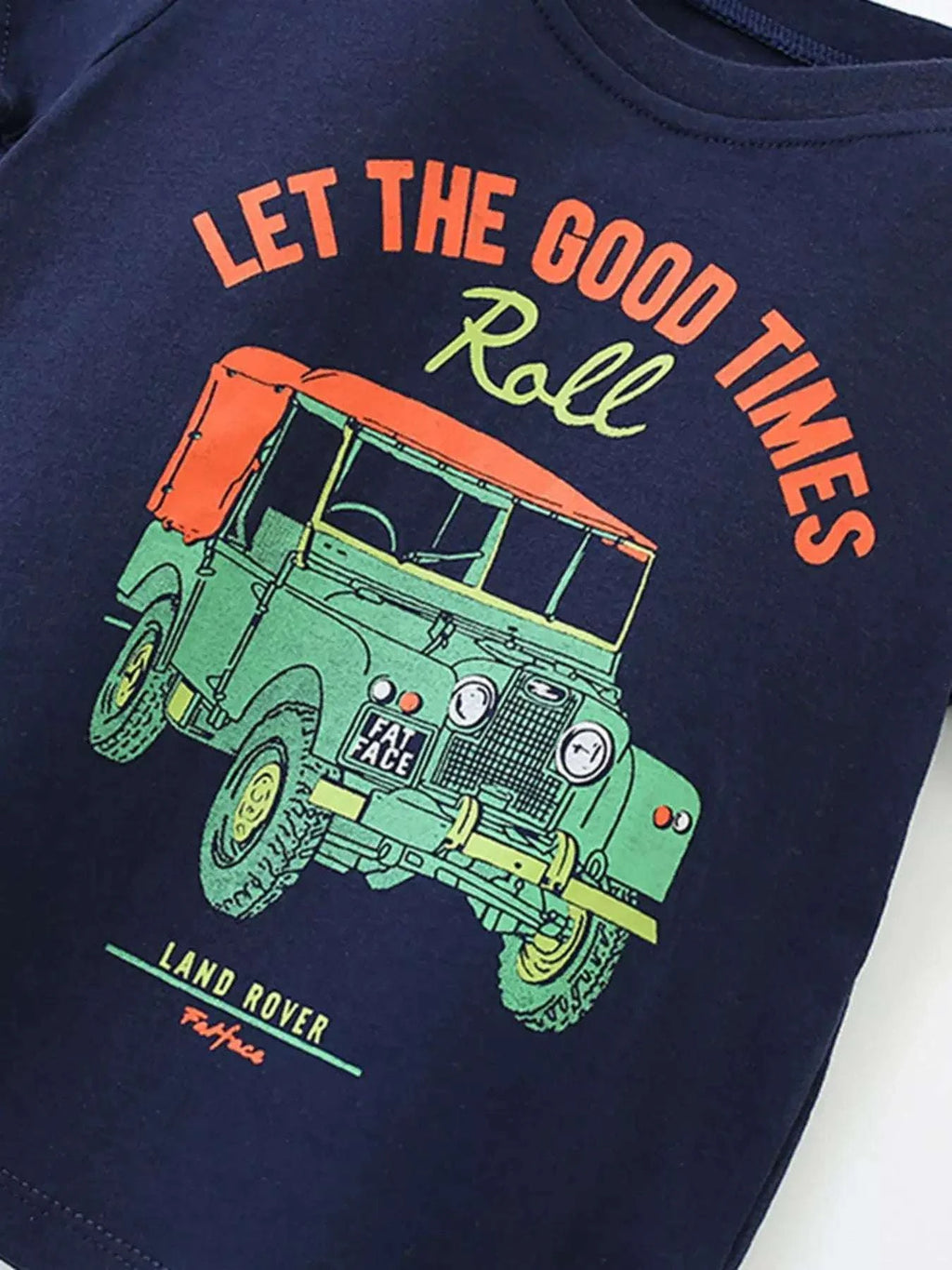 Dark navy crewneck graphic T-shirt with cartoon vehicle and 'Ralle' text