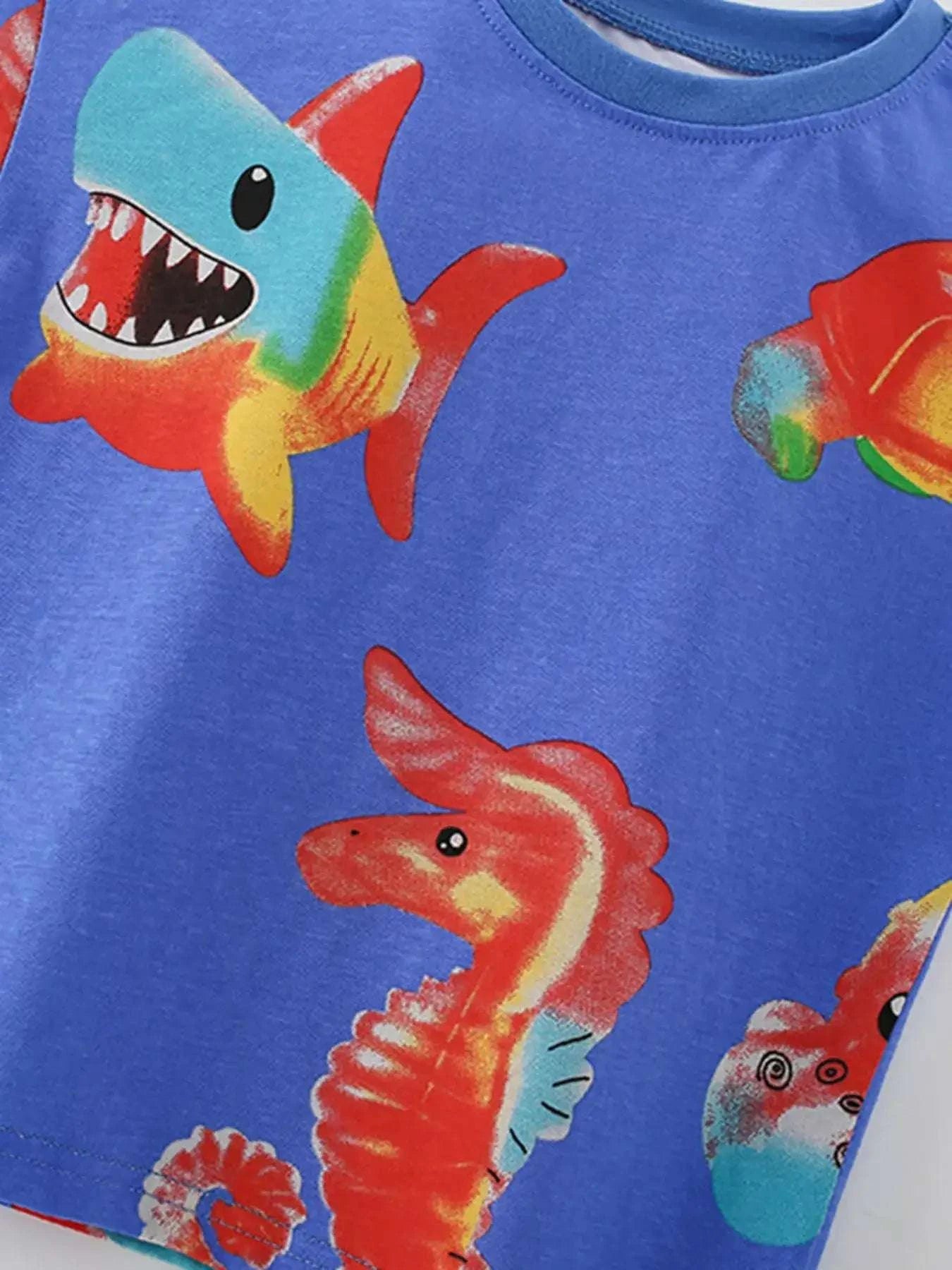 Kids ocean animal print tee-and-shorts set, royal blue tee front with shark and fish