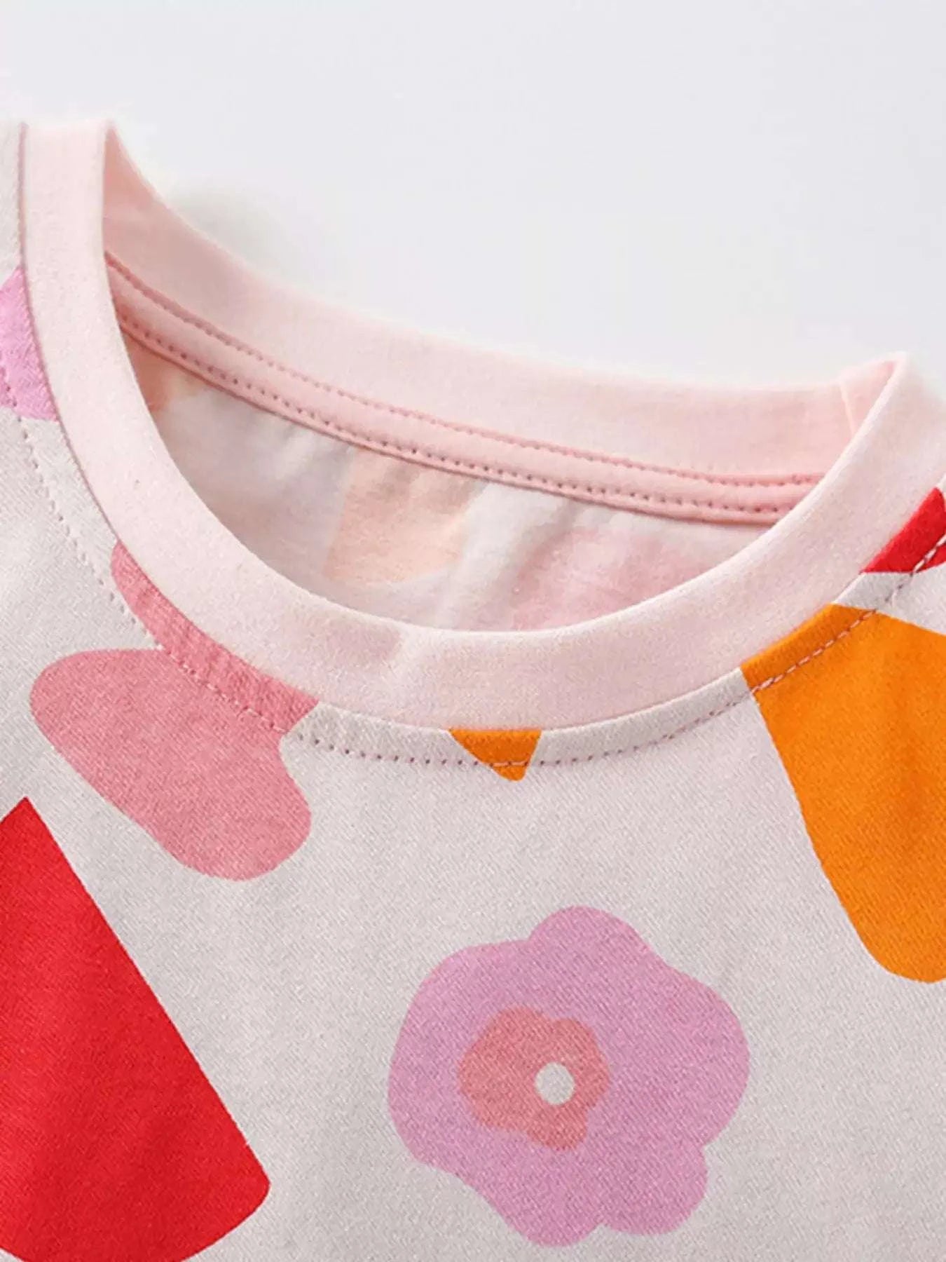 Children's printed round-neck top, pink and orange flower and heart motifs