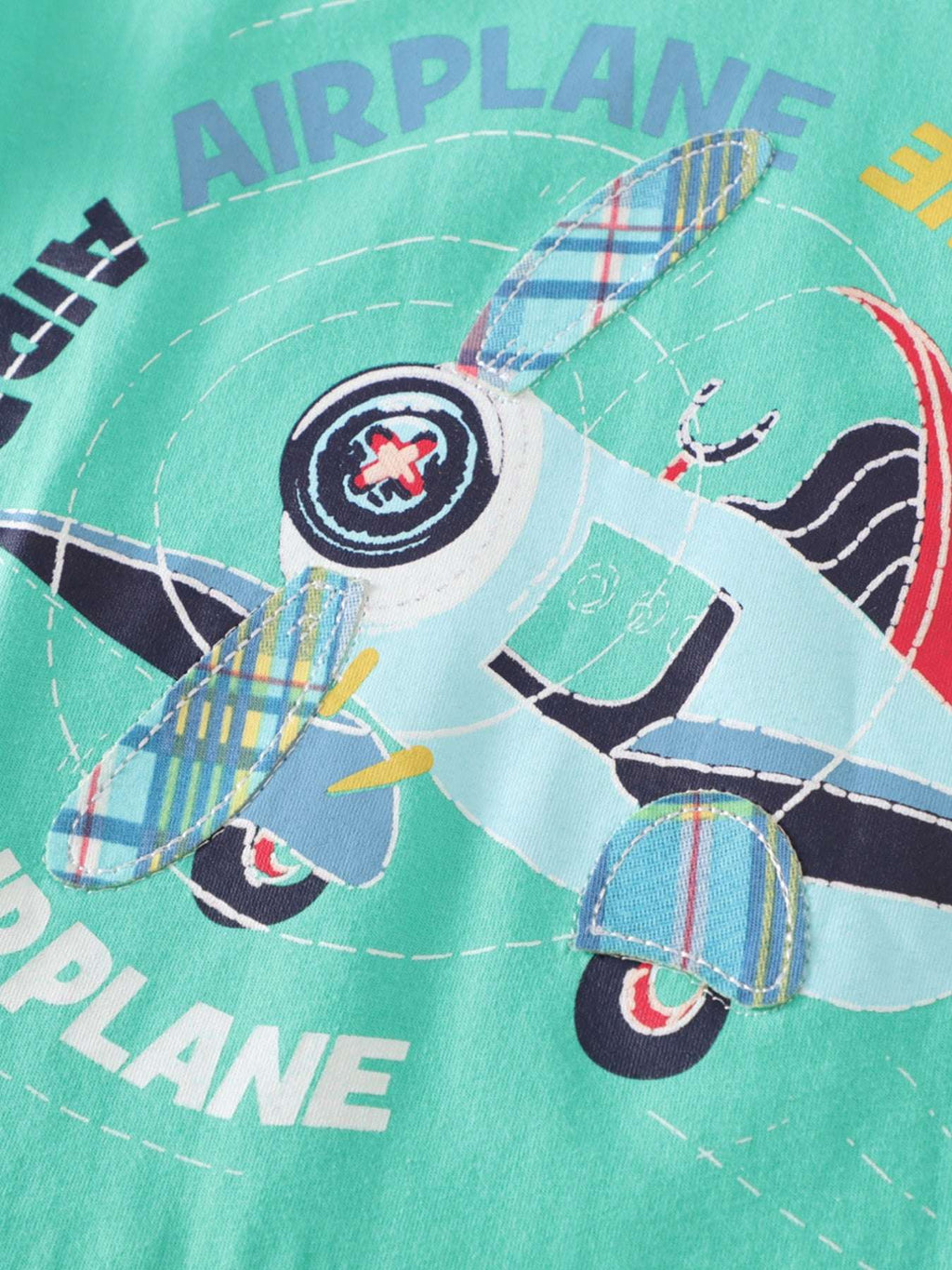 Turquoise airplane graphic tee with multicolor print