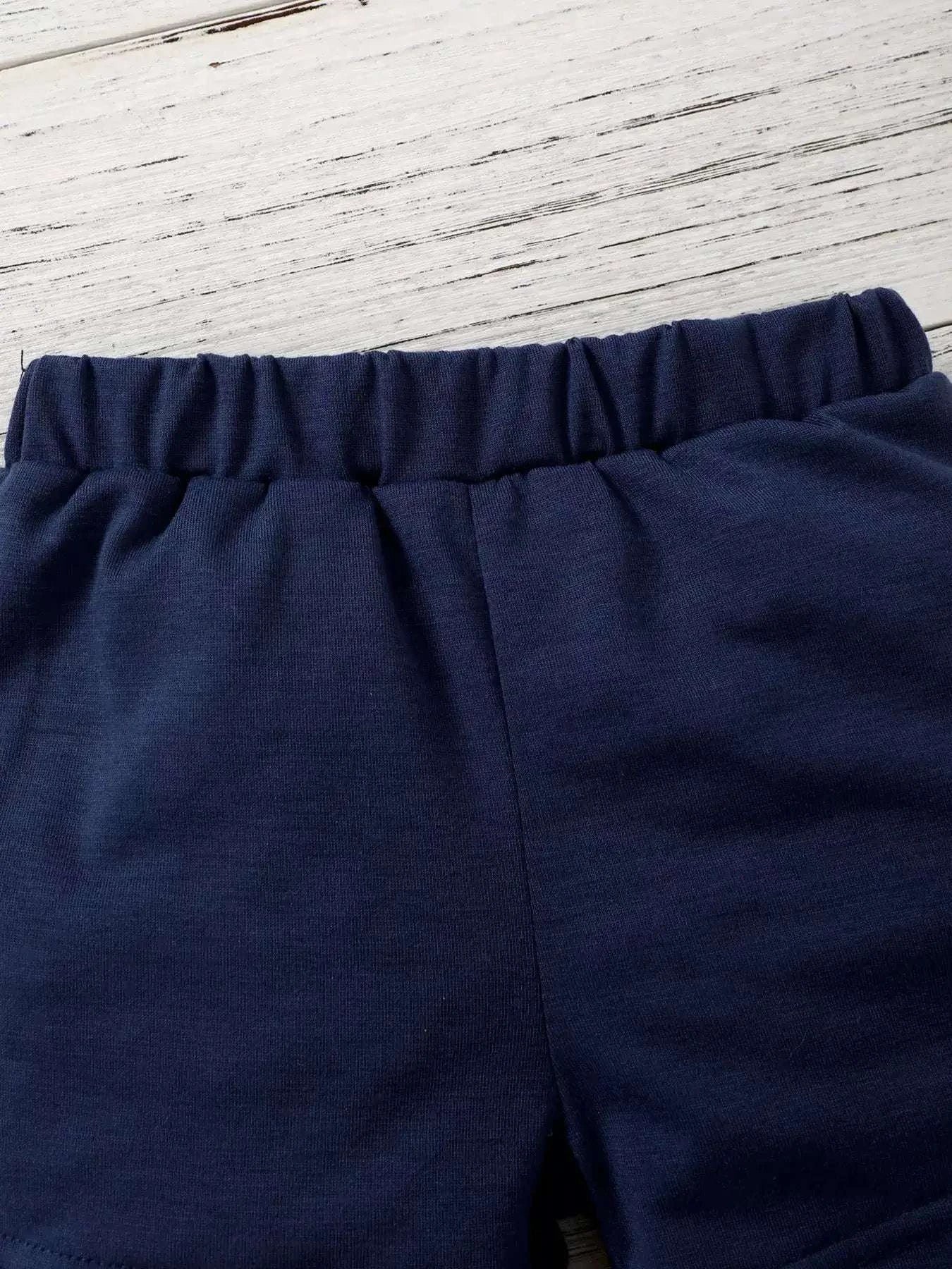 Navy kids shorts with elastic waistband and smooth solid knit