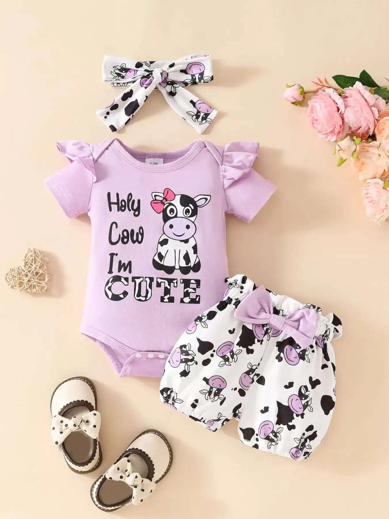 Violet ruffled cow bodysuit with cow-print shorts and purple bow headband set