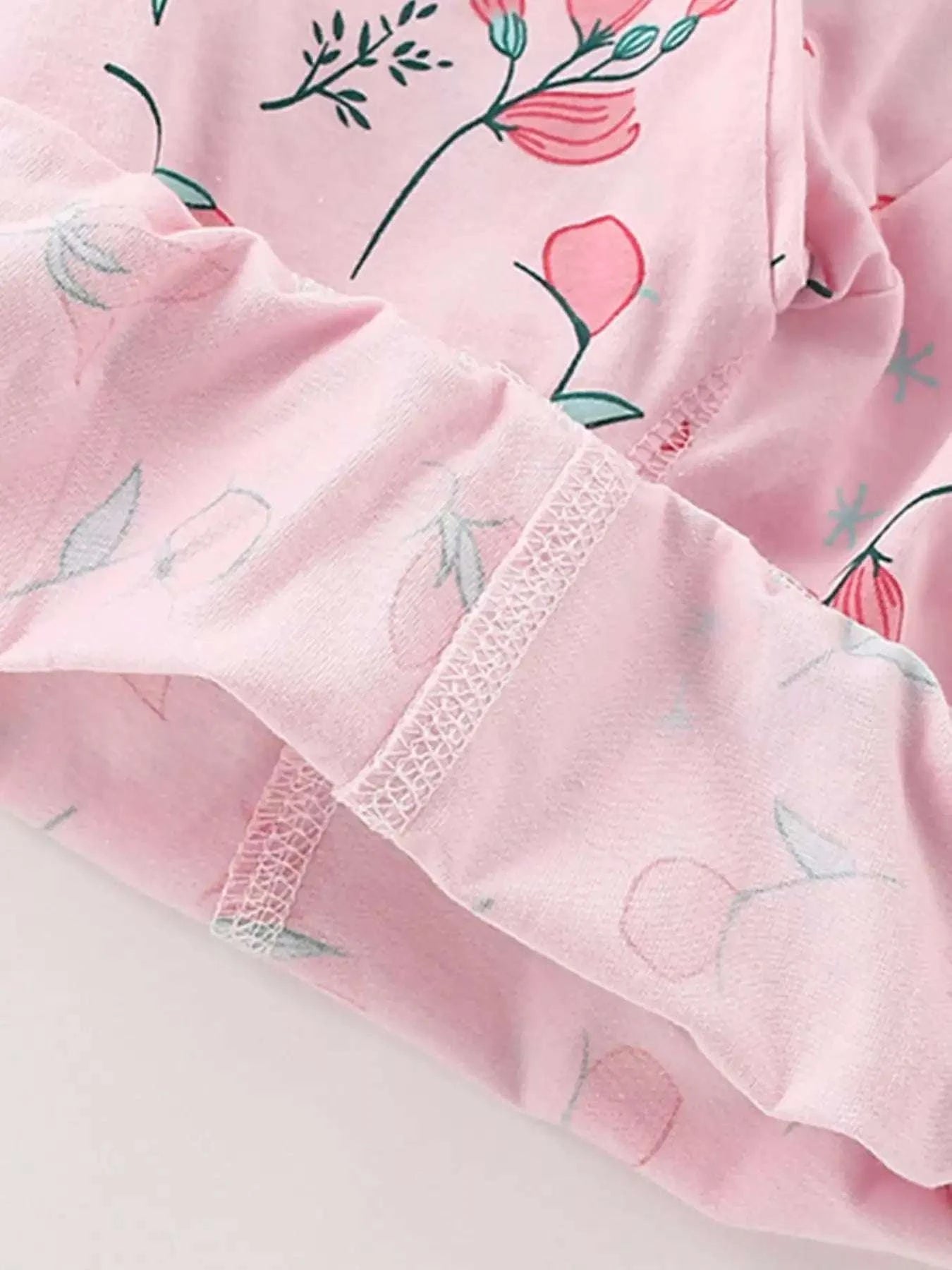 Blush pink kids short-sleeve tee with lace-trim cuff and floral print