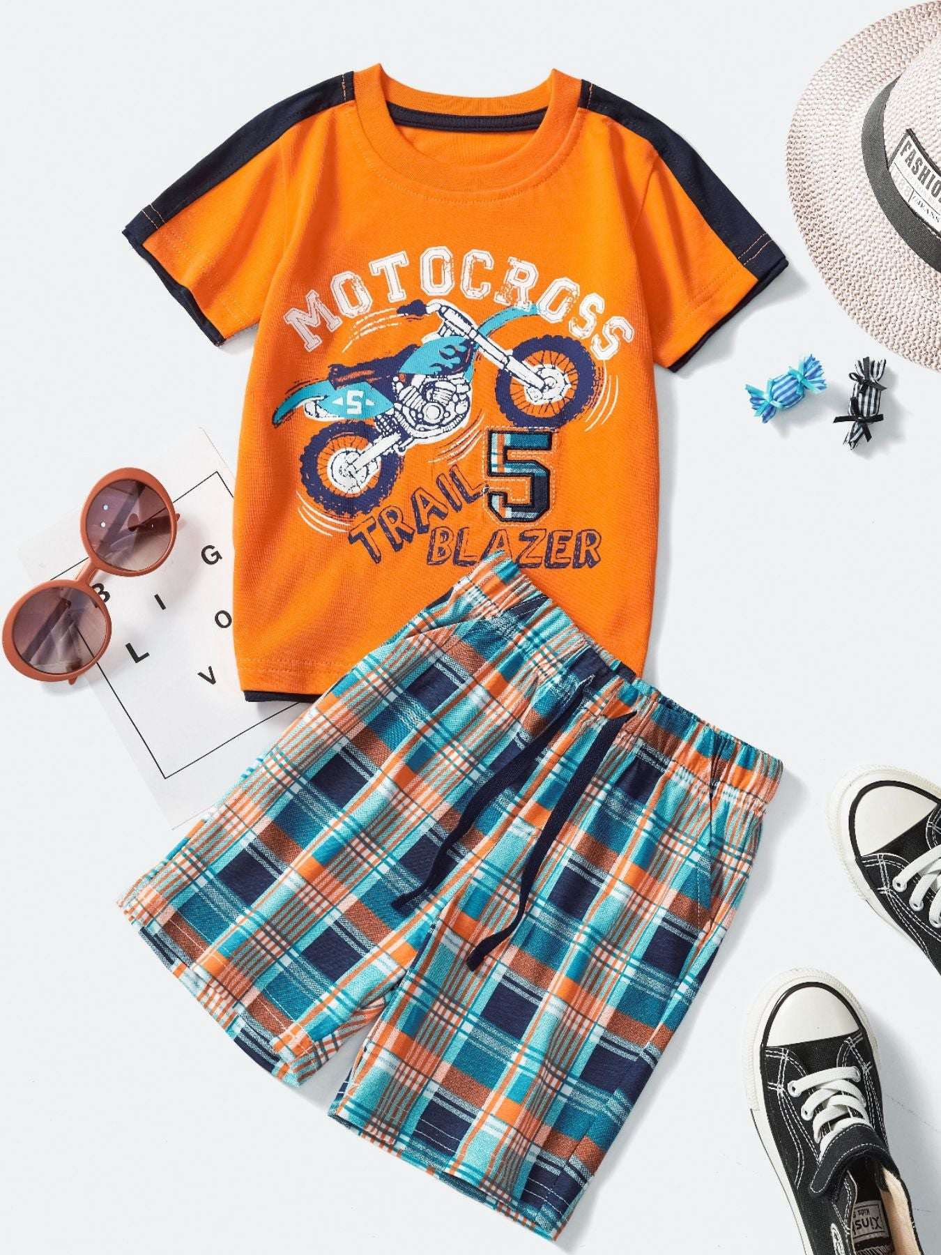 Children's tee and shorts set with orange graphic tee and multicolor plaid shorts