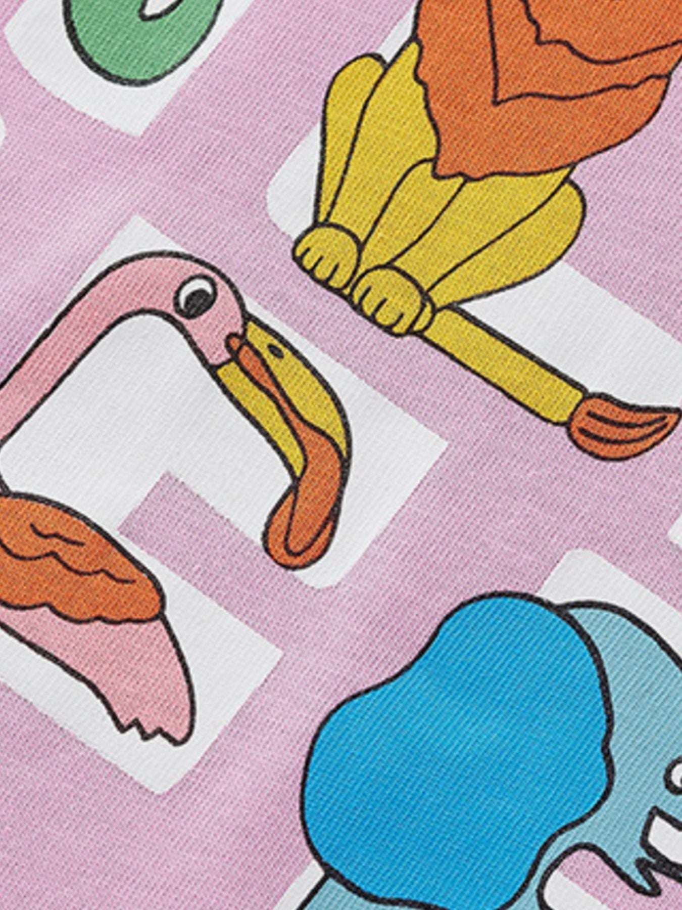 Dusty pink T-shirt close-up of colorful jungle animal graphic