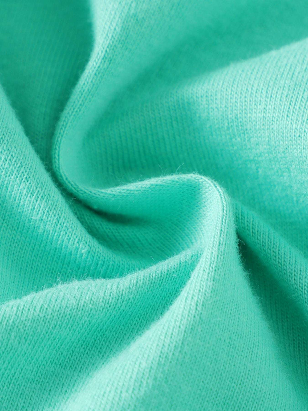Turquoise knit tee fabric with soft, textured surface