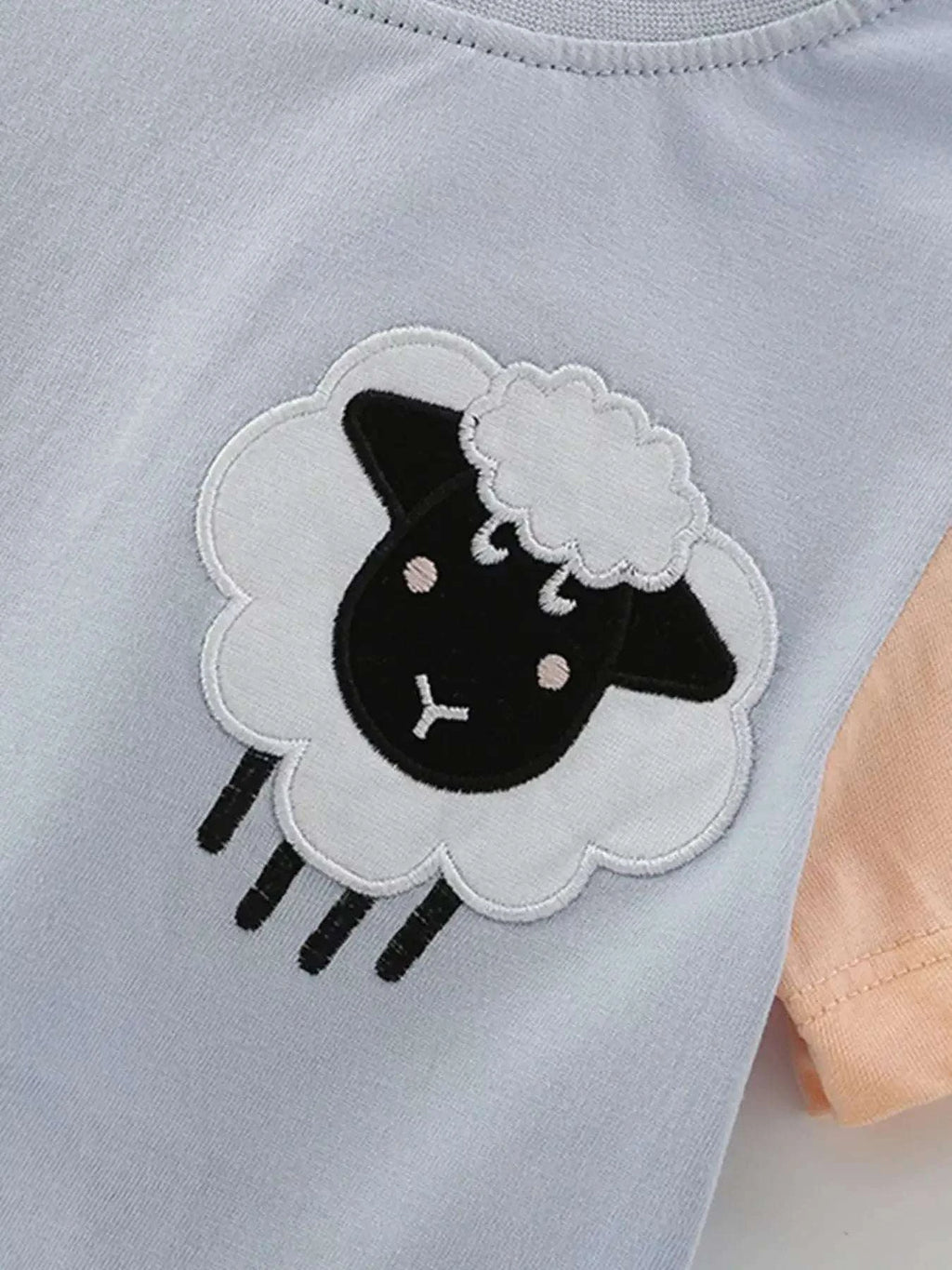 Light blue kids' tee with sheep applique graphic, long-ear design