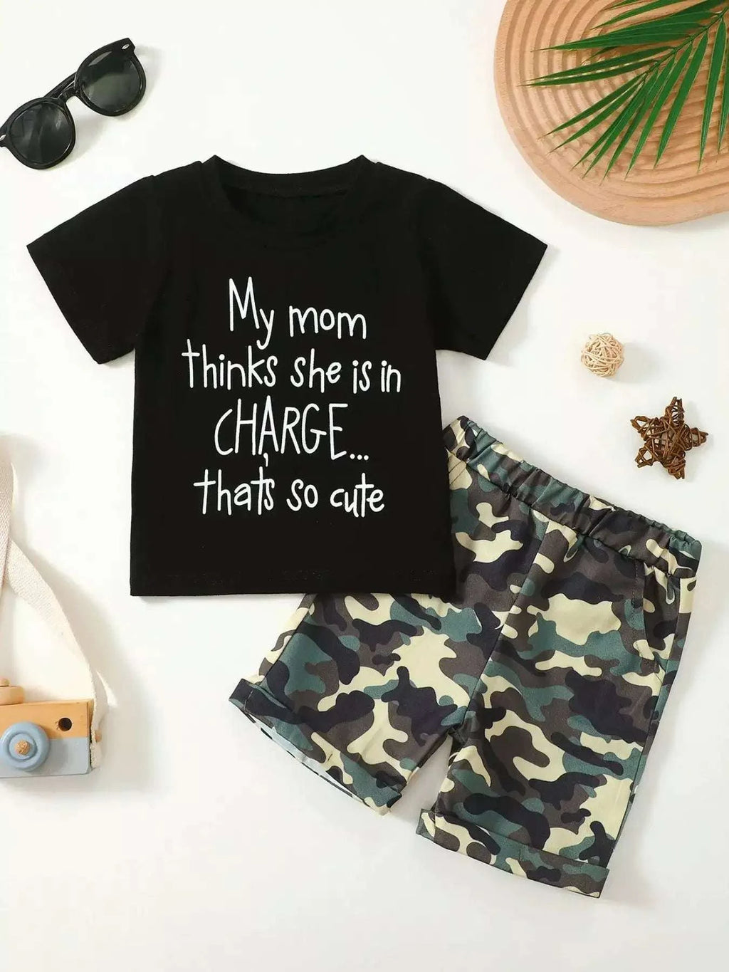 Kids black graphic tee and camouflage shorts set, text "My mom thinks she's in CHARGE"