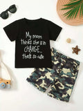 Kids black graphic tee and camouflage shorts set, text "My mom thinks she's in CHARGE"