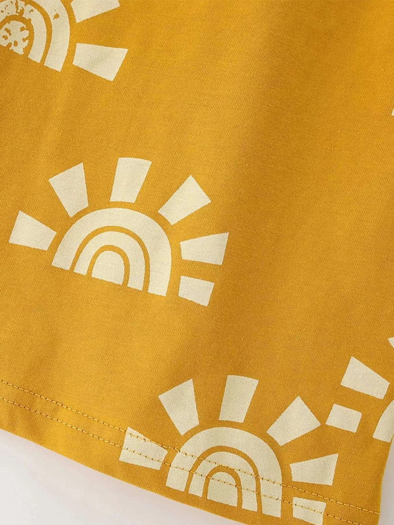 Gold short-sleeve tee with white sun and rainbow graphic print across chest