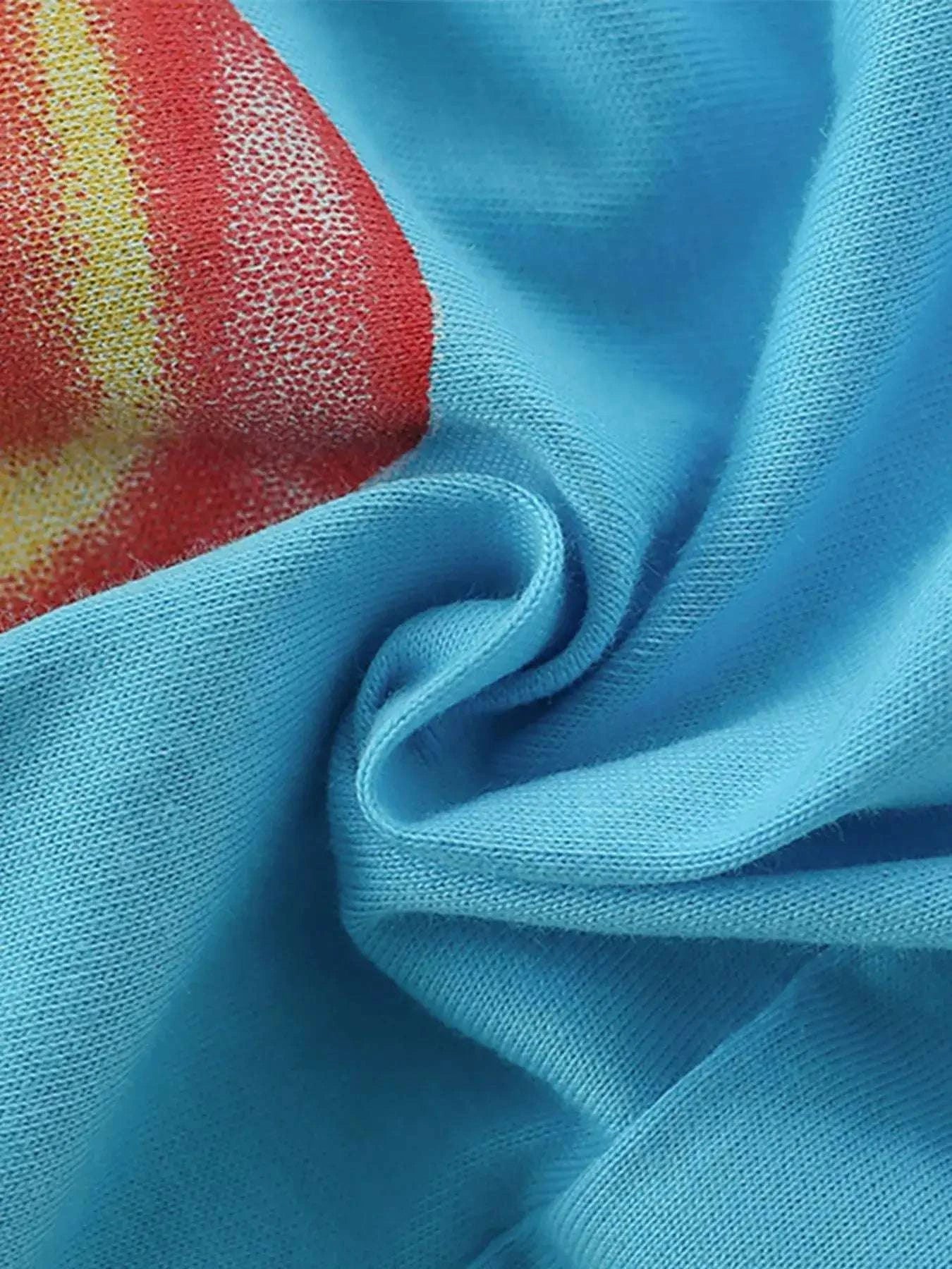 Light blue knit tee fabric close-up with soft textured weave