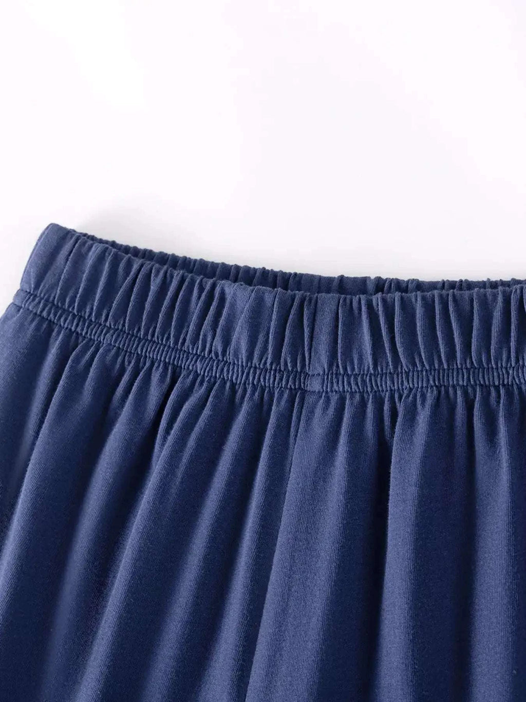 Navy elastic waistband shorts with gathered top edge