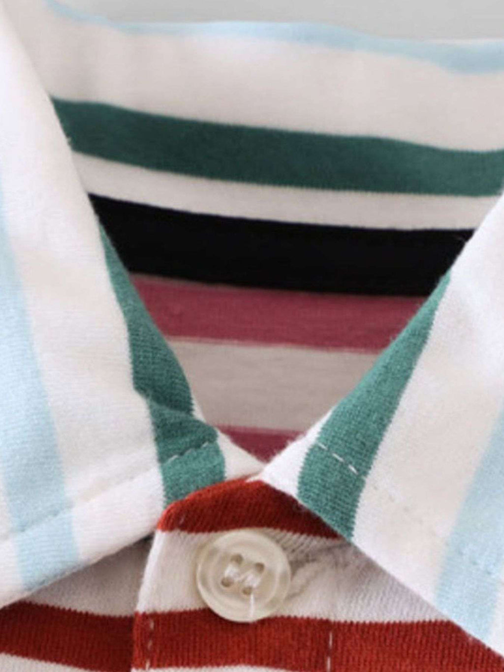 Striped polo collar with white fabric, green and red bands, button placket detail