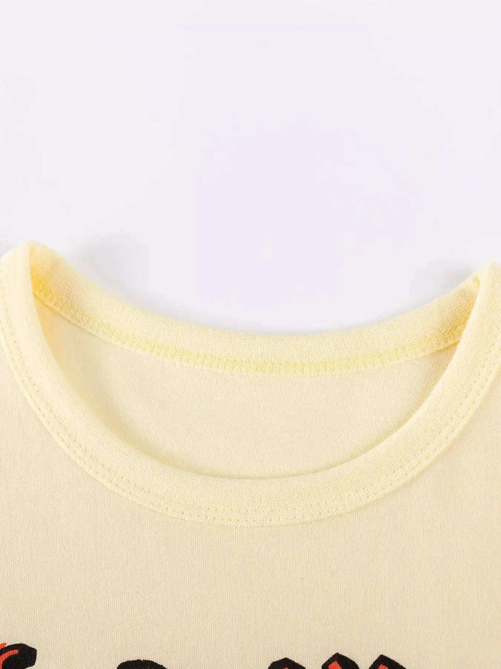 Yellow kids top crew neckline with soft knit finish