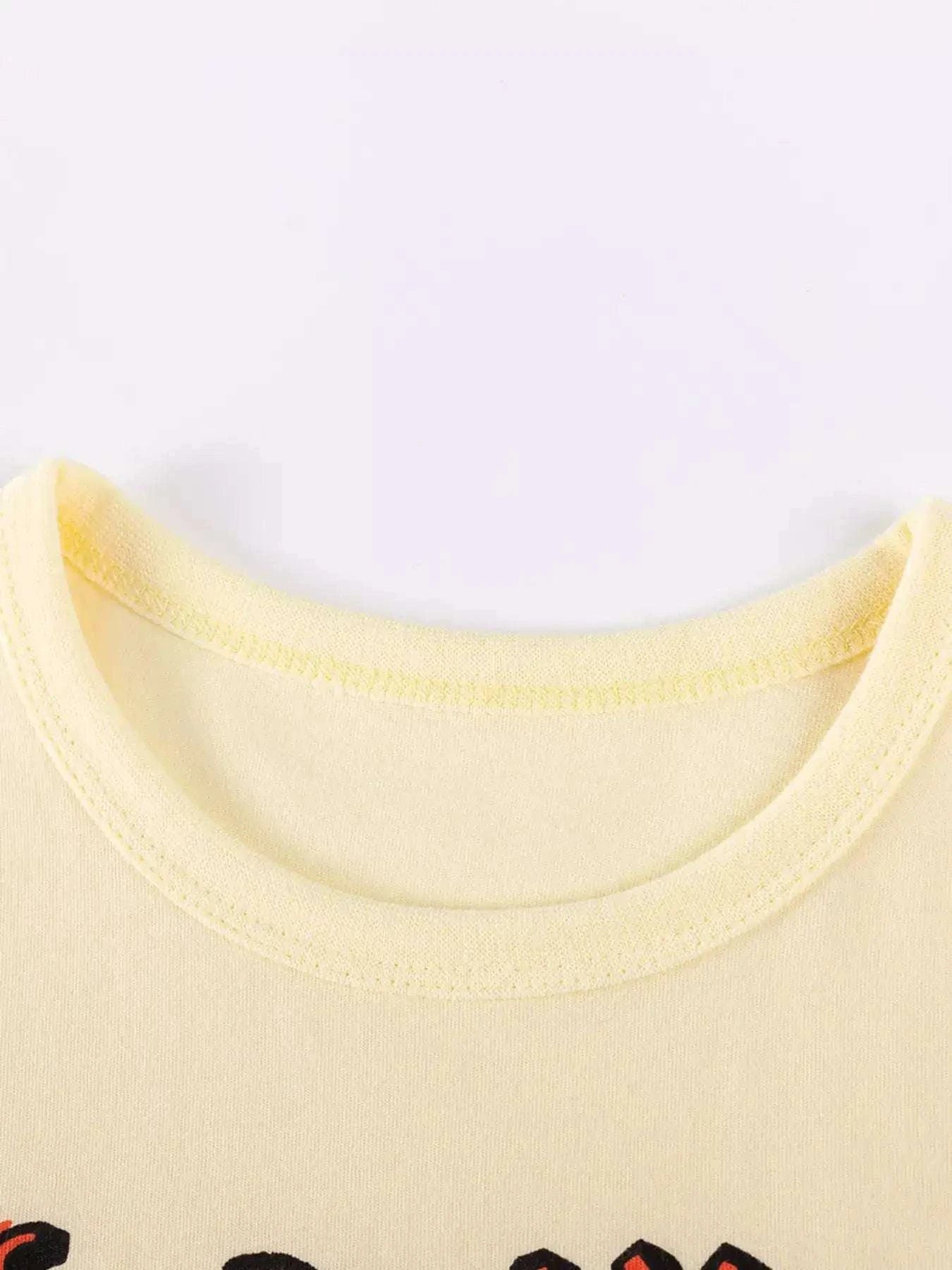 Yellow kids top crew neckline with soft knit finish