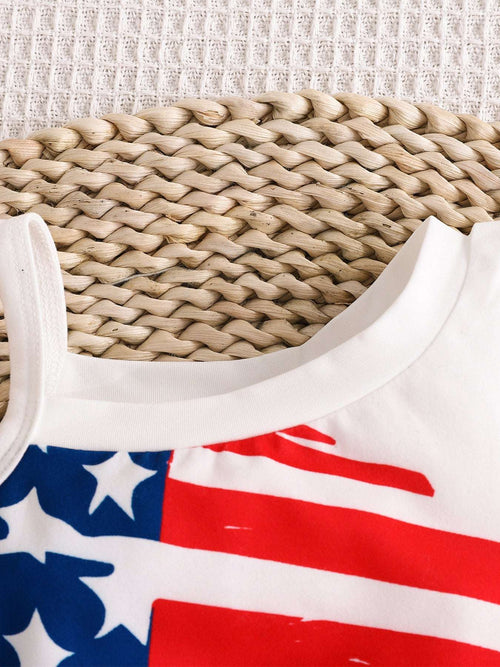 Kids tank top close-up: white armhole and stars-and-stripes American flag print