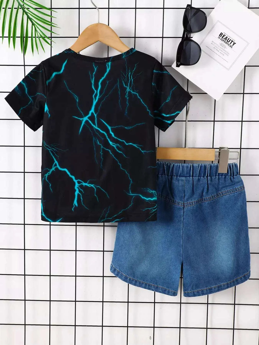 Black lightning print tee with blue denim shorts and elastic waist