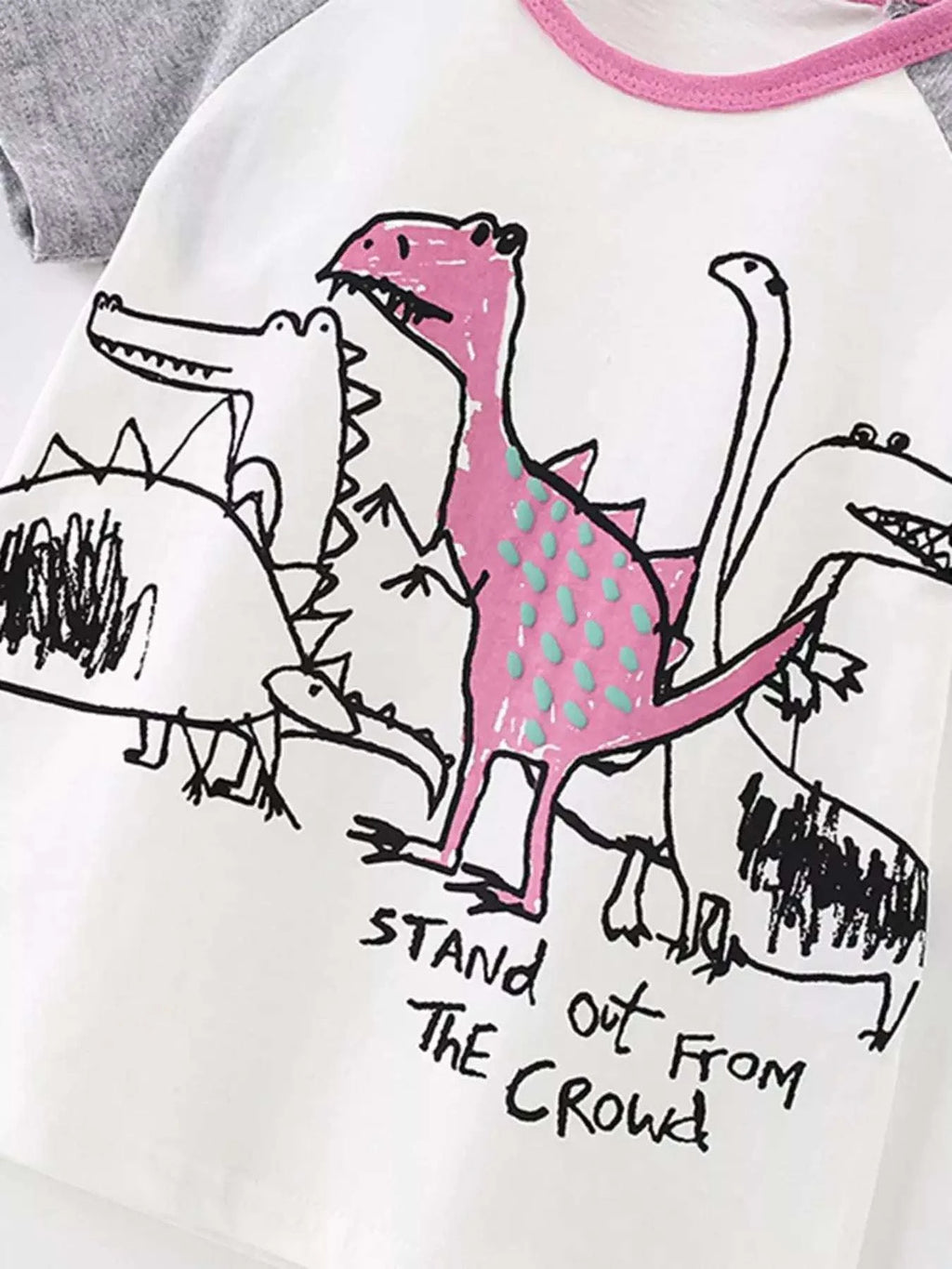 White children’s dinosaur crew neck T-shirt with pink collar and large pink graphic