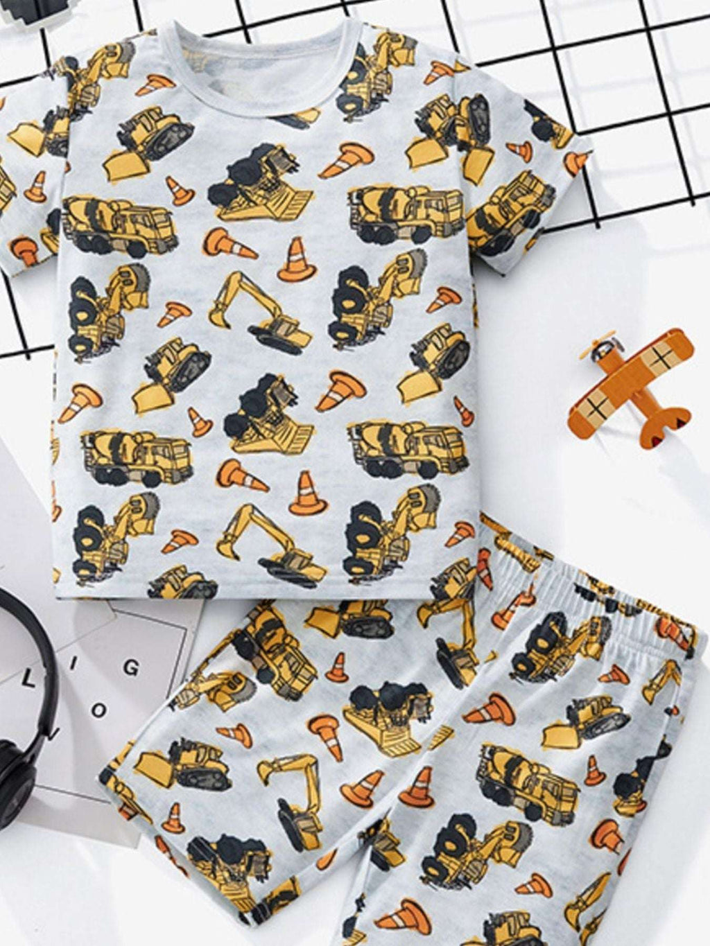 Kids construction print round-neck tee and shorts set, white with yellow and black vehicles