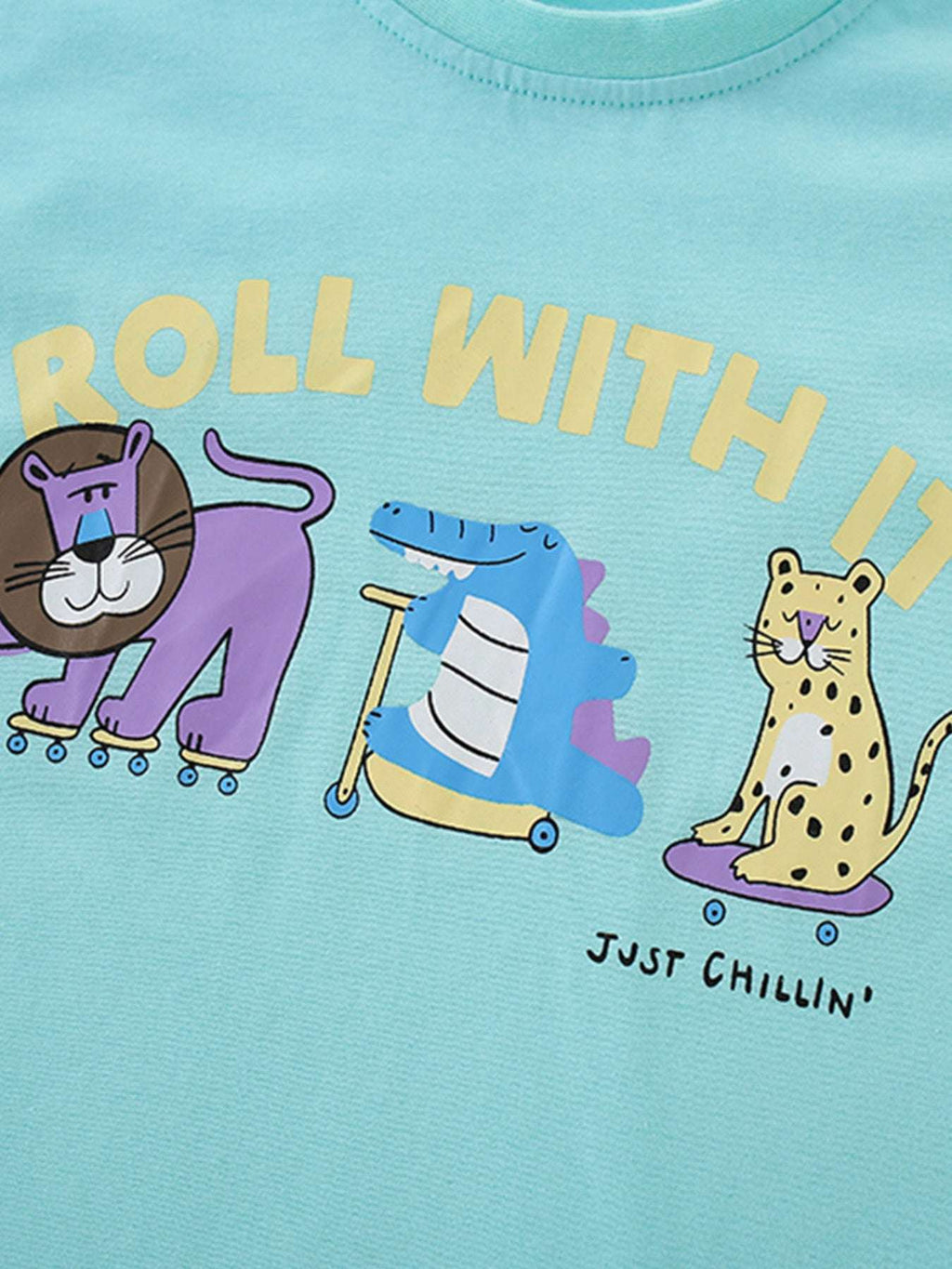 Children's aqua animal graphic t-shirt with skate cat and 'ROLL WITH IT' text