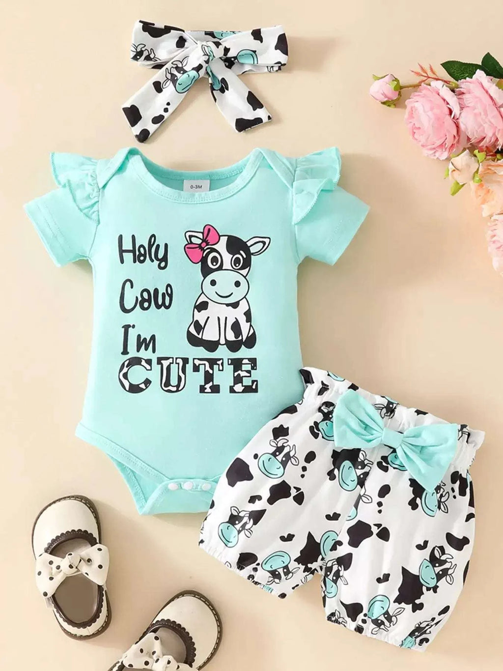Light blue ruffled cow bodysuit with printed shorts and matching bow headband set